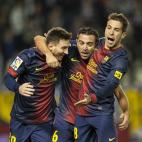 VALLADOLID, SPAIN - DECEMBER 22: Xavi Hernandez (C) of FC Barcelona celebrates with his teammates Lionel Messi (L) and Jordo Alba after scoring against Real Valladolid at Jose Zorrilla on December 22, 2012 in Valladolid, Spain. (Photo by Victo...