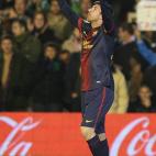 Barcelona's Leo Messi frm Argentina reacts after scoring against Betis during their La Liga soccer match at the Benito Villamarin stadium, in Seville, Spain, Sunday, Dec. 9, 2012. (AP Photo/Angel Fernandez)
