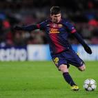 Barcelona's Argentinian forward Lionel Messi kicks the ball during the UEFA Champions League football match FC Barcelona vs SL Benfica at the Camp Nou stadium in Barcelona on December 5, 2012. AFP PHOTO / LLUIS GENE (Photo credit should ...