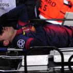 Barcelona's Argentinian forward Lionel Messi leaves the pitch on a stretcher after being injured during the UEFA Champions League football match FC Barcelona vs SL Benfica at the Camp Nou stadium in Barcelona on December 5, 2012. AFP PHOTO / JO...