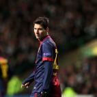 Barcelona's Lionel Messi, stand's dejected after being defeated by Celtic at the end of their Champions League Group G soccer match at Celtic Park, Glasgow, Scotland, Wednesday Nov. 7, 2012. (AP Photo/Scott Heppell)