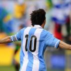 Argentinian soccer player Lionel Messi celebrates after scoring his third goal during a friendly match against Brazil at the MetLife Stadium in East Rutherford, New Jersey, on June 9, 2012. Argentina won 4-3. AFP PHOTO/Mehdi Taamallah ...