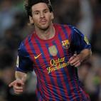 Barcelona's Argentinian forward Lionel Messi celebrates after scoring during the Spanish League football match Barcelona vs Malaga at the Camp Nou stadium in Barcelona on May 2, 2012. AFP PHOTO/ JOSEP LAGO (Photo credit should read JOSEP ...