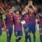 Barcelona's Argentinian forward Lionel Messi (3L) celebraes with teammates after the Spanish league football match FC Barcelona vs Malaga CF on May 2, 2012 at the Camp Nou stadium in Barcelona. Barcelona won 4-1. AFP PHOTO/LLUIS GENE (Pho...