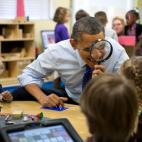 Feb. 14, 2013 "The President genuinely enjoys being with kids. Here, he played a magnifying glass game with children during a visit to a pre-kindergarten classroom at the College Heights Early Childhood Learning Center in Decatur, Georgia." (O...
