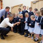 President Barack Obama and British Prime Minister David Cameron visit with students while touring Enniskillen Primary School in Enniskillen, Northern Ireland, June 17, 2013. (Official White House Photo by Pete Souza)