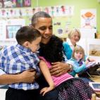 President Barack Obama hugs students during a visit to a pre-kindergarten classroom at the College Heights Early Childhood Learning Center in Decatur, Ga., Feb. 14, 2013. (Official White House Photo by Pete Souza)