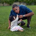 President Barack Obama plays with his niece Savita during the family's vacation on Martha's Vineyard, Aug. 25 2009. (Official White House Photo by Pete Souza)