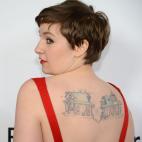 Lena Dunham shows off her tattoo at the premiere of "This Is 40" on Dec. 12, 2012, at Grauman's Chinese Theatre in Hollywood.
