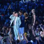 NEW YORK, NY - AUGUST 25: Ryan Lewis, Macklemore, and Ray Dalton accept their VMA presented by Lil Kim and Iggy Azalea onstage during the 2013 MTV Video Music Awards at the Barclays Center on August 25, 2013 in the Brooklyn borough of New York ...
