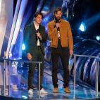 NEW YORK, NY - AUGUST 25: Ezra Koenig (L) and Christopher Tomson of Vampire Weekend speak onstage during the 2013 MTV Video Music Awards at the Barclays Center on August 25, 2013 in the Brooklyn borough of New York City. (Photo by Jemal Counte...