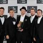 A reunited 'N Sync including Justin Timberlake (C), JC Chasez (L), Lance Bass (2nd L), Joey Fatone (2nd R), and Chris Kirkpatrick (R) at the MTV Video Music Awards August 25, 2013 at the Barclays Center in New York. AFP PHOTO/Stan HONDA (...
