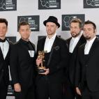 A reunited 'N Sync including Justin Timberlake (C), JC Chasez (L), Lance Bass (2nd L), Joey Fatone (2nd R), and Chris Kirkpatrick (R) at the MTV Video Music Awards August 25, 2013 at the Barclays Center in New York. AFP PHOTO/Stan HONDA (...