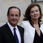 France's president Francois Hollande and his companion Valerie Trierweiler leave the Elysee presidential Palace in Paris, after he being officially invested as France's president on May 15, 2012, at the end of the formal investiture ceremony.