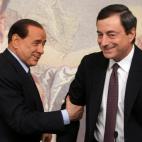 Con Berlusconi, en 2008.