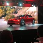 A Tesla Model 3 sedan, the company's first car aimed at the mass market, is displayed during its launch in Hawthorne, California, March 31, 2016.