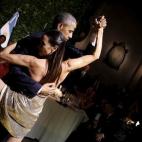 Obama se marca un tango durante la cena en su honor que le dedicaron en Buenos Aires.