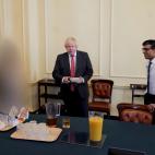 British Prime Minister Boris Johnson and Chancellor of the Exchequer Rishi Sunak are seen in cabinet room in 10 Downing Street during Johnson's birthday, in London, Britain June 19, 2020 in this picture obtained from civil servant Sue Gray's rep...
