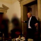 British Prime Minister Boris Johnson gestures in 10 Downing Street during gathering on the departure of a special adviser, in London, Britain November 13, 2020 in this picture obtained from civil servant Sue Gray's report published on May 25, 20...