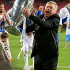 Real Madrid manager Carlo Ancelotti celebrates with the UEFA Champions League Trophy