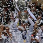 Real Madrid's Cristiano Ronaldo lifts the UEFA Champions League Trophy after the UEFA Champions League Final at at the Estadio da Luiz, Lisbon, Portugal.