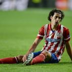 Atletico Madrid's Thiago lies dejected