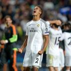 Real Madrid's Raphael Varane celebrates after team-mate Marcelo scores his side's third goal