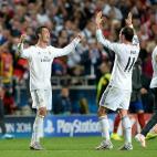 Real Madrid's Cristiano Ronaldo (left) and Gareth Bale celebrate after the game