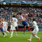 Atletico Madrid's Diego Godin scores his side's first goal