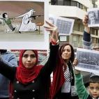 Manifestación contra los ataques saudíes sobre Yemen en Beirut (Líbano). "Dios maldice a Arabia Saudí", se lee en los carteles.