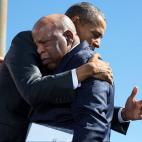 Obama hugs Rep. John Lewis (D-Ga.) after his introduction during the event to commemorate the 50th anniversary of Bloody Sunday and the Selma to Montgomery civil rights marches at the Edmund Pettus Bridge in Selma, Alabama, on March 7, 2015.