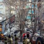 MAGNITOGORSK, RUSSIA - DECEMBER 31, 2018: Russian Emergency Situations Ministry employees at the site of an apartment building collapse. A suspected domestic gas blast caused a partial collapse of a residential building at 164 Karla Marksa Prosp...