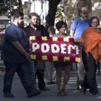 La delegaci&oacute;n de Podem, en la ofrenda floral.