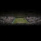 Una vista general al partido en el que Milos Raonic jugó contra Roger Federer, en el campeonato de Wimbledon, en Inglaterra.