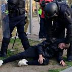 Police detain a person during a demonstration against a political rally of far-right party Vox ahead of regional elections in Madrid's suburb of Vallecas on April 7, 2021. (Photo by JAVIER SORIANO / AFP) (Photo by JAVIER SORIANO/AFP via Getty Images)