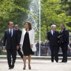 France's President Francois Hollande (C,L) and his companion Valerie Trierweiler (C,R) arrive at the Tuileries Garden in Paris to attend a tribute ceremony to the 19th century education reformer Jules Ferry, following the formal handover of inve...