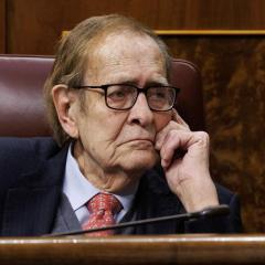 Mirando la hora, como Tamames
