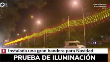 Almeida coloca una bandera gigante de España con luces de Navidad en pleno centro de Madrid