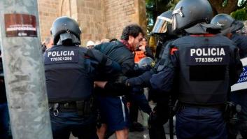 Trece detenidos, cargas policiales y una veintena de carreteras cortadas en las protestas por el 21-D en Barcelona
