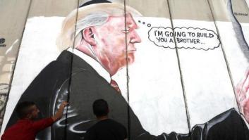 Una pintada en la valla de separación israelí caricaturiza a Trump y su plan de nuevos muros