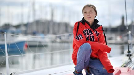Swedish climate activist Greta Thunberg poses for a photograph during an inteview with AFP onboard the Malizia II sailing yacht at the Mayflower Marina in Plymouth, southwest England, on August 13, 2019 ahead of her journey across the Atlantic t...