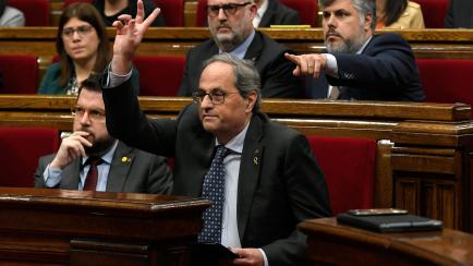 Catalan president Quim Torra asks for the floor during a plenary session at the parliament of Catalonia on January 27, 2020 in Barcelona. - Spain's electoral board ordered on January 3, 2020 that Catalan separatist president Quim Torra be disqua...