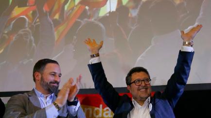 Spain's far-right VOX party leader Santiago Abascal and regional candidate Francisco Serrano celebrate results after the Andalusian regional elections in Seville, Spain December 2, 2018. REUTERS/Marcelo Del Pozo