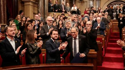 BARCELONA, SPAIN - JANUARY 04: President of the Government of Catalonia Quim Torra  (1st R) and Vice-President of the Government of Catalonia Pere Aragones (2nd R) attend the Extraordinary Plenary session at Parliament of Catalonia on January 04...