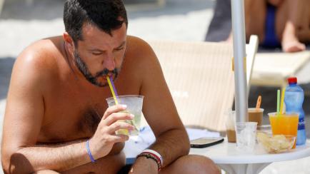 Italian Interior Minister and leader of the League party Matteo Salvini enjoys a refreshment at the Caparena beach in the Sicilian seaside town of Taormina, Italy, August 11, 2019. REUTERS/Antonio Parrinello