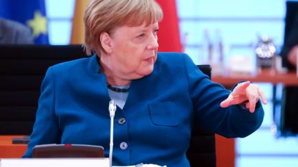 German Chancellor Angela Merkel attends the weekly cabinet meeting on April 22, 2020 at the Chancelery in Berlin, as the spread of the new coronavirus that can cause the COVID-19 disease continues. (Photo by HANNIBAL HANSCHKE / POOL / AFP) (Phot...