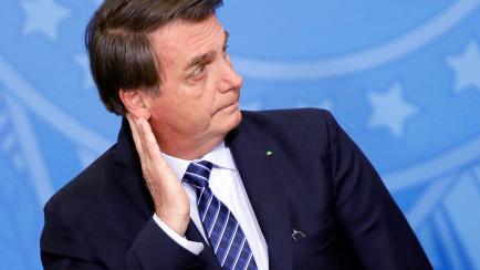 Brazil's President Jair Bolsonaro reacts during a launching ceremony of public policies against violent crimes at the Planalto Palace in Brasilia, Brazil August 29, 2019. Picture taken August 29, 2019. REUTERS/Adriano Machado