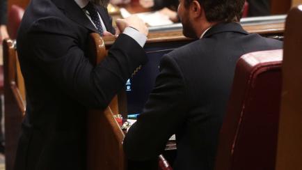 MADRID, SPAIN - DECEMBER 03: The president of Vox, Santiago Abascal (L), and the president of PP, Pablo Casado (R), are seen during the constitution session of the Courts for the XIV legislature at the Congress of Deputies on December 03, 2019 i...