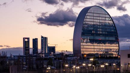 Madrid, Spain - March 7, 2020: View of the skyline of Madrid with Las Tablas residential district, BBVA office building and Cuatro Torres financial district at sunset.