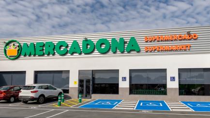 View of entrance and parking lot of Mercadona supermarket in Punta Umbria, Huelva, Spain.